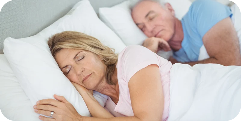 Older couple sleeping